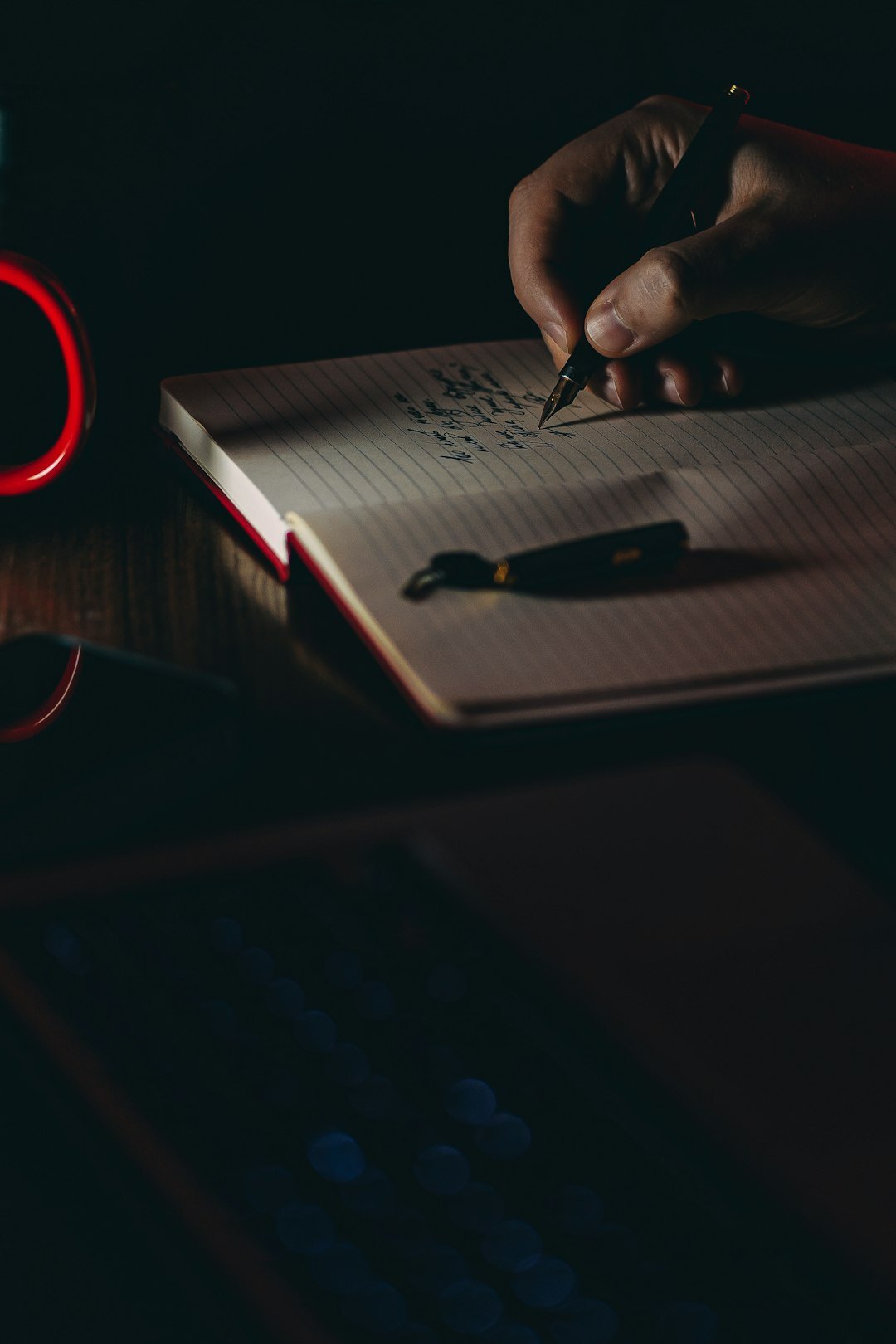 person writing notes