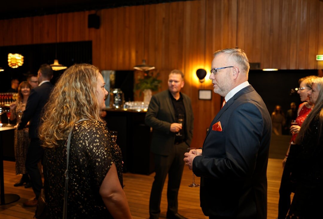 business professionals networking at event