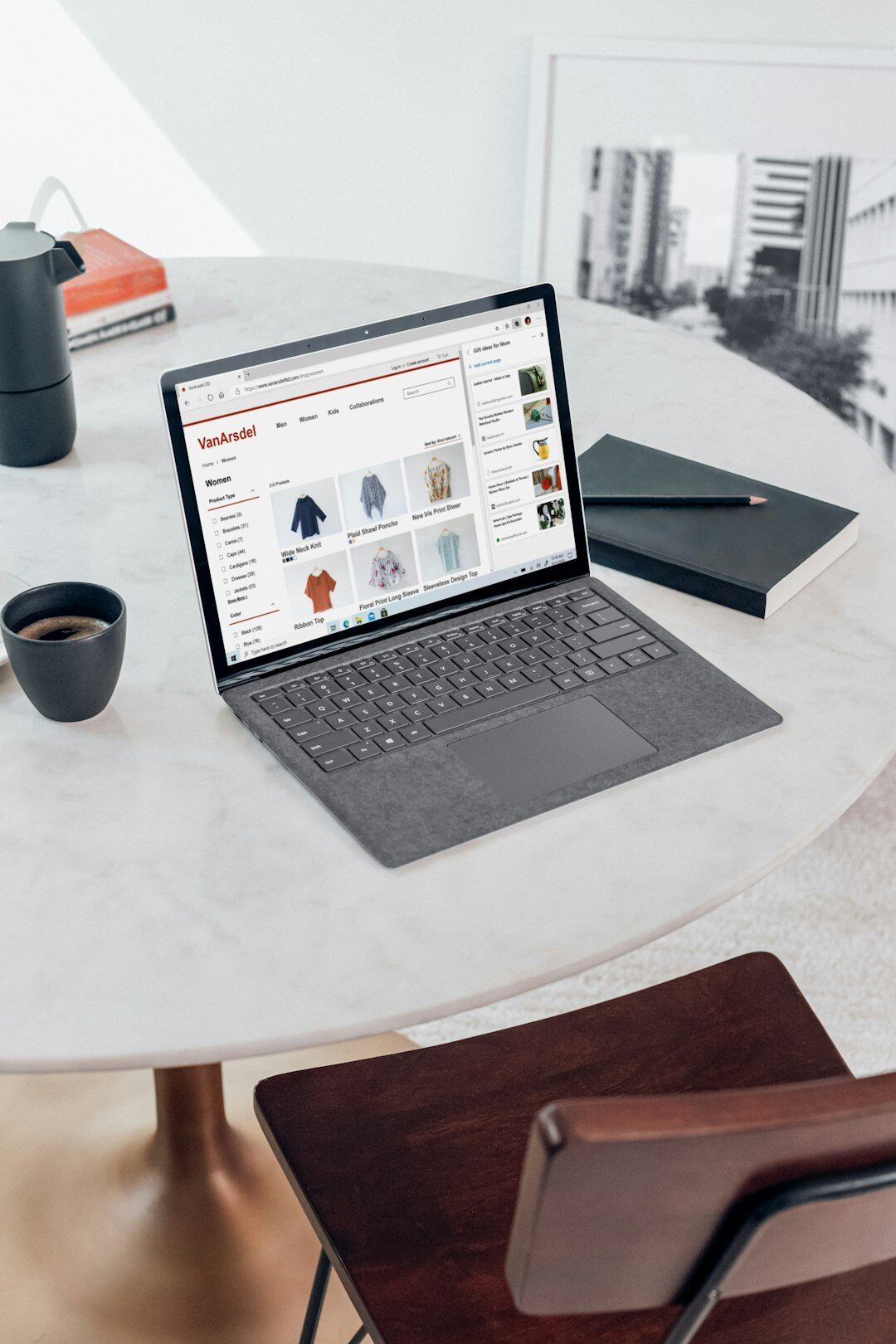 Open laptop on a desk displaying a business dashboard