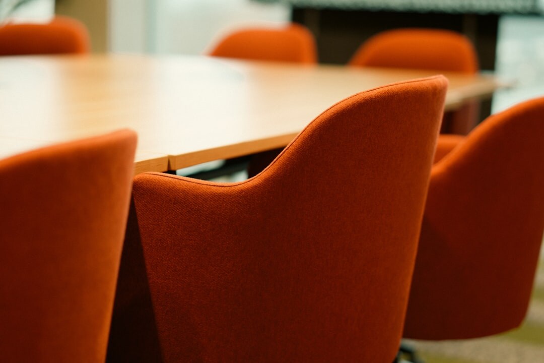 corporate handshake in boardroom